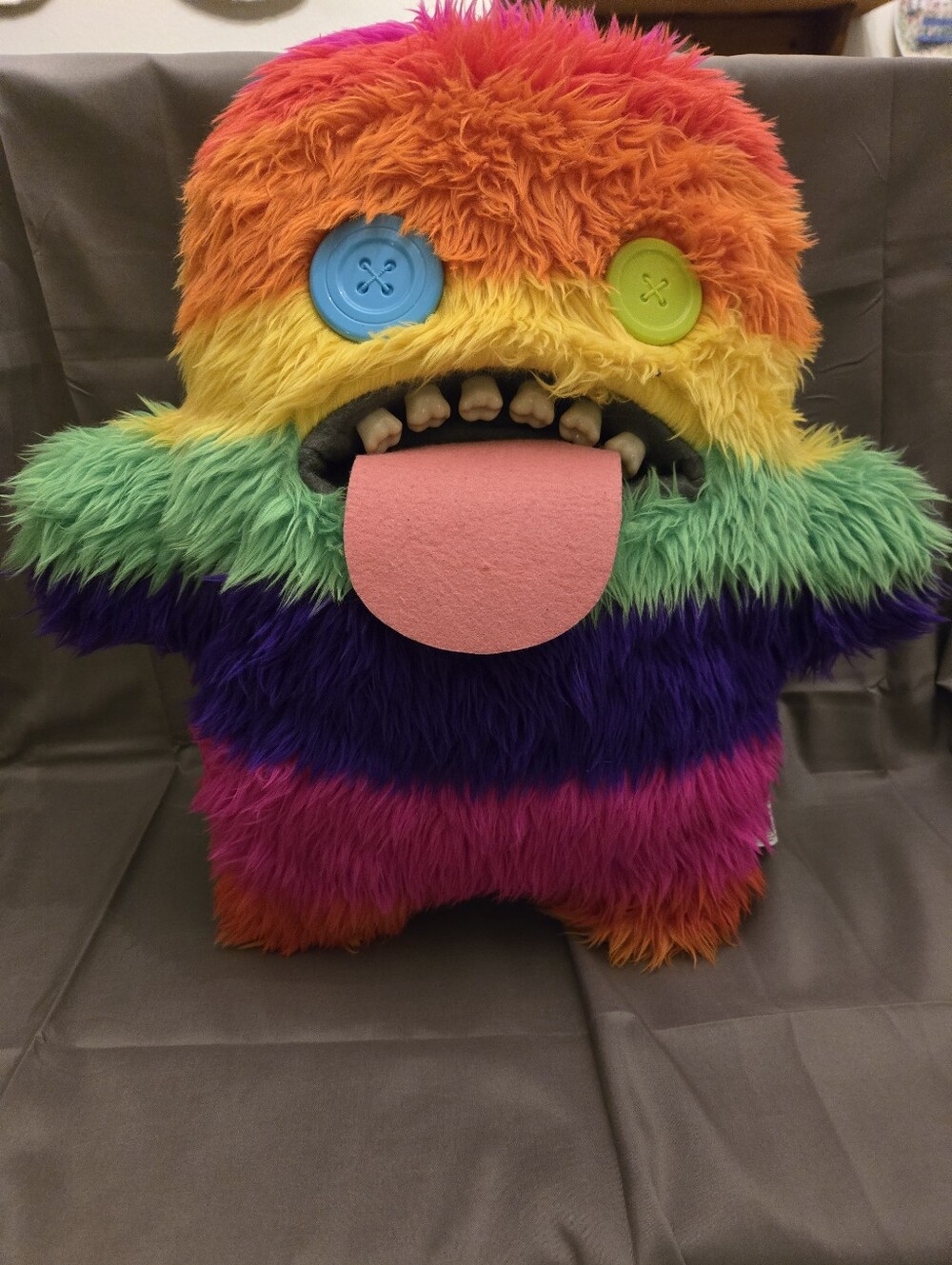 ZURU Bigg Fuggler plush toy in the "Oogah Boogah" rainbow stripe design,...